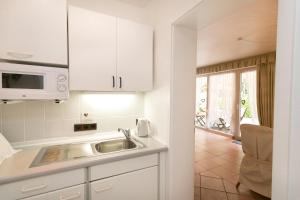 Kuchyň nebo kuchyňský kout v ubytování Ferienhaus In Walkenried Mit Schöner Terrasse