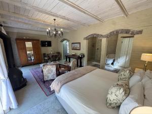 Ένα ή περισσότερα κρεβάτια σε δωμάτιο στο Hartland Garden Suite