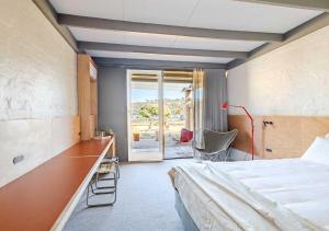 Ένα ή περισσότερα κρεβάτια σε δωμάτιο στο Tween Waters Merimbula +49 φωτογραφίες