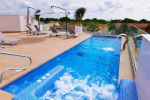 Bazén v ubytování Casa Nieve by Rental Hero nebo v jeho okolí