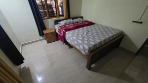 En eller flere senge i et værelse på Shajis Riverview Mansion + 1 billede