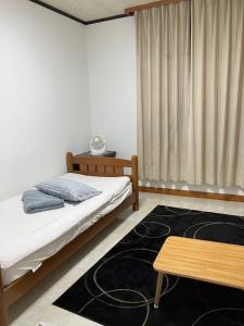 Postel nebo postele na pokoji v ubytování Ichigoso - Vacation STAY 20025