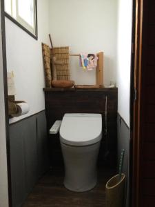 a bathroom with a white toilet in a room at Ichigoso - Vacation STAY 20260 in Ichihara