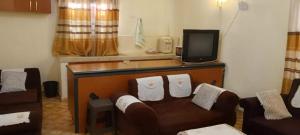 Μια τηλεόραση ή/και κέντρο ψυχαγωγίας στο Pam Palatial Home