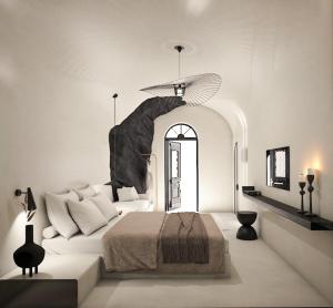 a white bedroom with a bed and a ceiling at Anemos Caldera Oia in Oia +63 photos
