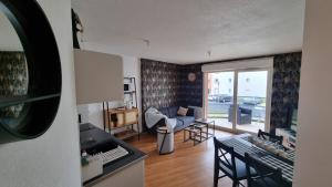 Χώρος καθιστικού στο Appartement avec parking privé