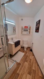 Ένα ή περισσότερα κρεβάτια σε δωμάτιο στο Appartement avec parking privé