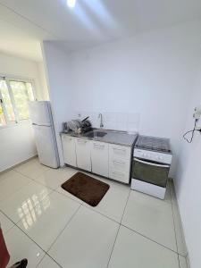 Kuchyň nebo kuchyňský kout v ubytování GuestHouse 16