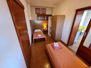 Ένα ή περισσότερα κρεβάτια σε δωμάτιο στο Apartments Vinea