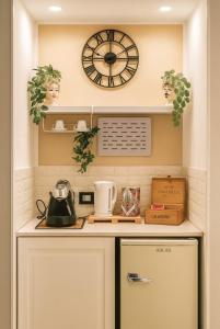 Η κουζίνα ή μικρή κουζίνα στο Etna Charme Guest House