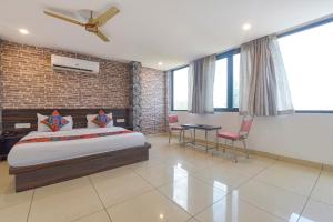 Ένα ή περισσότερα κρεβάτια σε δωμάτιο στο Hotel Neelambar Villa +21 φωτογραφίες