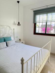 Ένα ή περισσότερα κρεβάτια σε δωμάτιο στο Lanzarote Lovers - Your peaceful corner