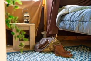 Ένα ή περισσότερα κρεβάτια σε δωμάτιο στο Camping 3 étoiles - Parc aquatique - ccba0ec