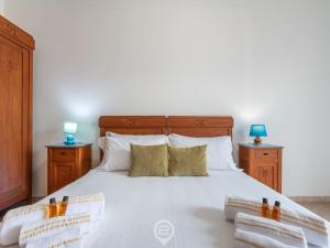 Postel nebo postele na pokoji v ubytování House Afrodite + 26 fotografií