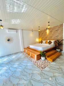 Postel nebo postele na pokoji v ubytování Maleesha Homestay