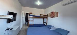 En eller flere senge i et værelse på Casa, Piscina, Sinuca Churrasqueira, Ping Pong, Praia Guarujá + 22 billeder