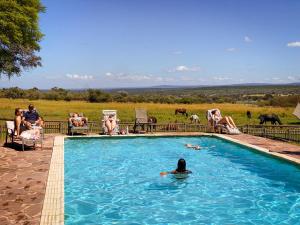 Πισίνα στο ή κοντά στο AfriCamps Waterberg