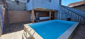 Swimmingpoolen hos eller tæt på Casa, Piscina, Sinuca Churrasqueira, Ping Pong, Praia Guarujá
