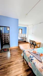 Ένα ή περισσότερα κρεβάτια σε δωμάτιο στο Eton Homestay