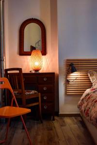 Ένα ή περισσότερα κρεβάτια σε δωμάτιο στο Guest House Rifugio Urbano