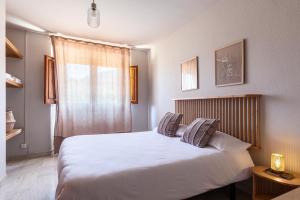 Ένα ή περισσότερα κρεβάτια σε δωμάτιο στο Can Romagueras +68 φωτογραφίες