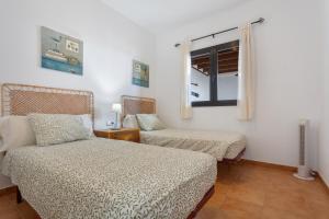 En eller flere senge i et værelse på Villa Alfredina + 23 billeder