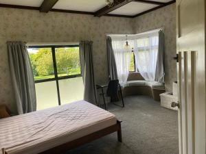 Ένα ή περισσότερα κρεβάτια σε δωμάτιο στο 顺顺顺之家