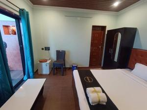 Ένα ή περισσότερα κρεβάτια σε δωμάτιο στο Ocean Retreat +3 φωτογραφίες