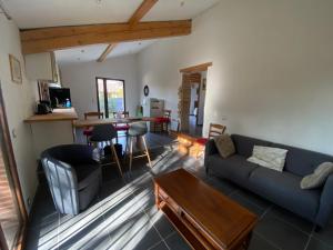 Posezení v ubytování La maison du pin