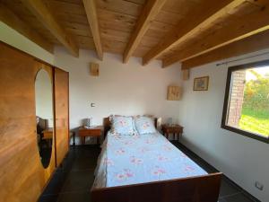 Postel nebo postele na pokoji v ubytování La maison du pin