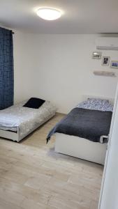 Ένα ή περισσότερα κρεβάτια σε δωμάτιο στο Vila Country Mornings