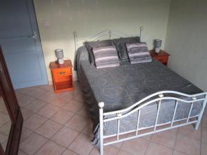 Ένα ή περισσότερα κρεβάτια σε δωμάτιο στο Le clos des érables