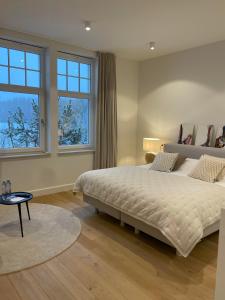 Postel nebo postele na pokoji v ubytování Villa Magnolia B&B