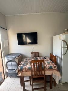 Et tv og/eller underholdning på Microcasa Aconchegante, tudo para sua hospedagem!