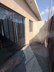 En balkon eller terrasse på Microcasa Aconchegante, tudo para sua hospedagem!