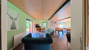 En eller flere senge i et værelse på Domaine du Val de Tamié