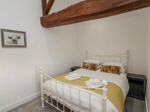 En eller flere senge i et værelse på The Robins Nest