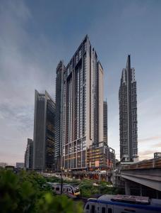 a group of tall buildings in a city at Amari Kuala Lumpur in Kuala Lumpur