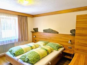 Ένα ή περισσότερα κρεβάτια σε δωμάτιο στο Holiday Home Waldhof by Interhome