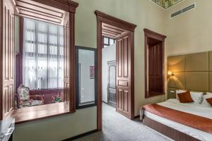 Giường trong phòng chung tại Boutique Garden De Baku