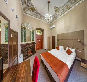 Postel nebo postele na pokoji v ubytování Boutique Garden De Baku