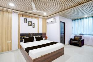 Ένα ή περισσότερα κρεβάτια σε δωμάτιο στο Hotel O Sunshine Classic