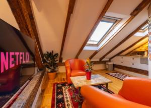 Posezení v ubytování The Cozy Main Square Rooftop