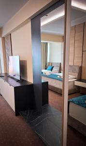 Ένα ή περισσότερα κρεβάτια σε δωμάτιο στο Hotel Brcko Gas Prijedor +29 φωτογραφίες