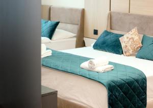 Ένα ή περισσότερα κρεβάτια σε δωμάτιο στο Hotel Brcko Gas Prijedor