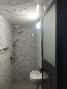 Ένα μπάνιο στο Super appartement quartier paisible proches toutes commodités