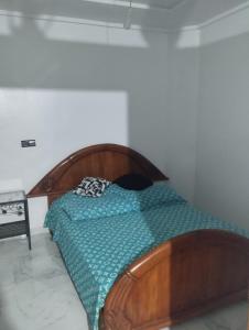 Ένα ή περισσότερα κρεβάτια σε δωμάτιο στο Super appartement quartier paisible proches toutes commodités