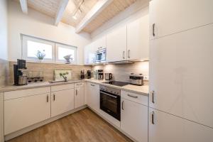 Kuchyň nebo kuchyňský kout v ubytování Tweete Heimaat