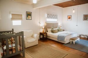 Ένα ή περισσότερα κρεβάτια σε δωμάτιο στο The Townhouse