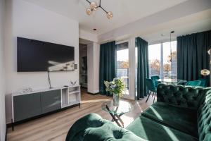 Μια τηλεόραση ή/και κέντρο ψυχαγωγίας στο AboutArtApartments - Krzywoustego